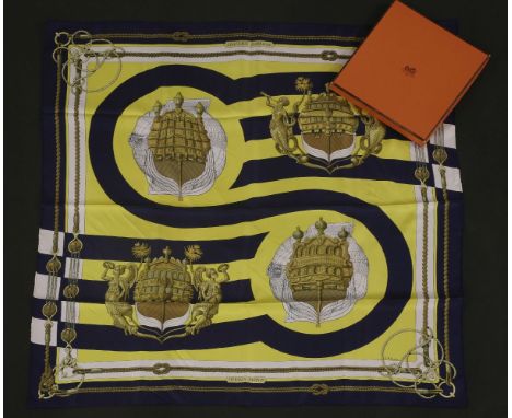 An Hermès silk scarf,'Chateau d Arriere', designed by Julia Abadie, navy ground with a nautical design, in box with carrier b