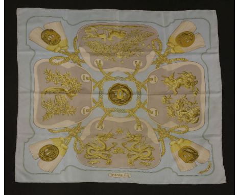 An Hermès vintage silk scarf, 'Tsubas', c.1970, designed by Christine Vauzelle, pale turquoise ground, printed with handbags 