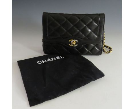 A Chanel vintage 'Paris Limited' black quilted lambskin flap shoulder bag,with two-tone 'CC' twist lock to front flap, with d