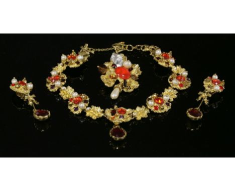 A vintage Christian Lacroix molten effect necklace, earring and brooch suite,set with assorted orange and red paste stones, w