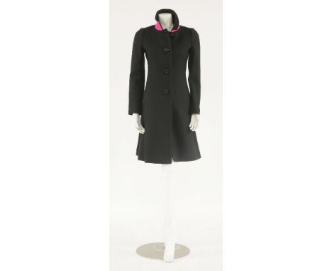 A Kate Spade black wool coat, button-up front with pink lining,size O