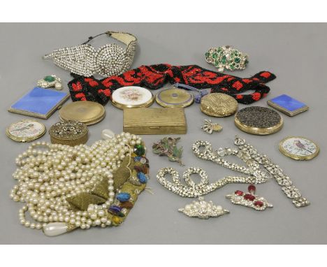 A collection of costume jewellery,1920s and later,accessories to include a diamanté belt, later made into a headband, circula