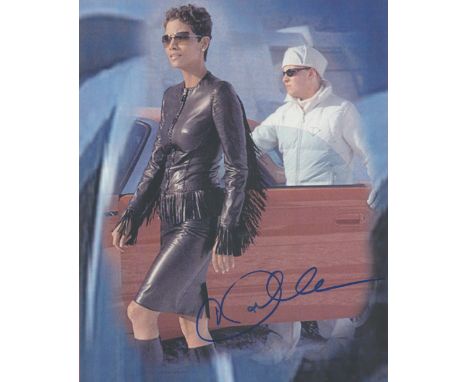 Halle Berry signed 10 x 8 inch colour James Bond portrait photo. All autographs come with a Certificate of Authenticity. We c