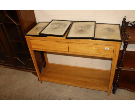 A modern light wood side table fitted two drawers and under tier 