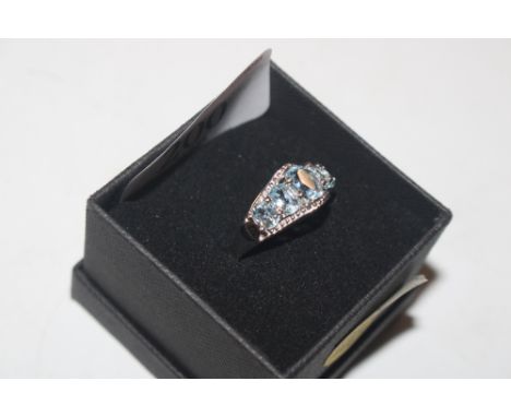 A silver and aquamarine set ring, ring size P