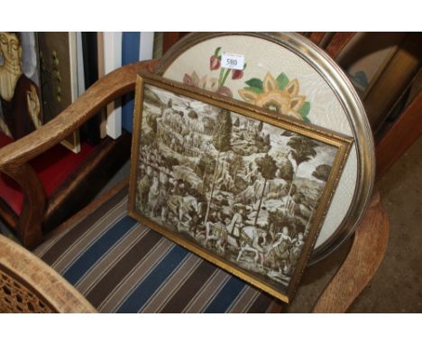 A circular floral embroidery and an old master style print