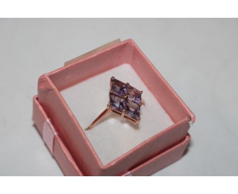 A rose Sterling silver and amethyst coloured set dress ring, size V/W