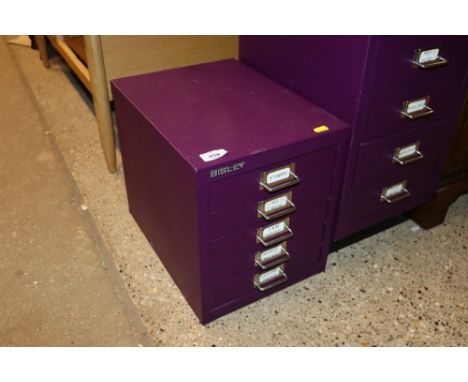 A Bisley desk top multi drawer unit in purple 