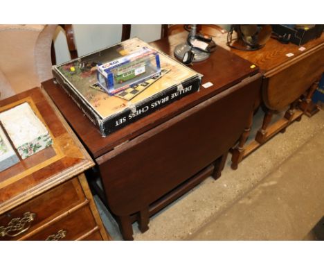 An oak gate leg dining table 