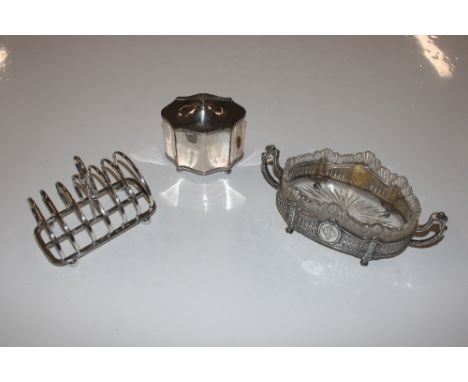 A continental white metal glass lined fruit dish; a plate on copper caddy; and a white metal six division toast rack