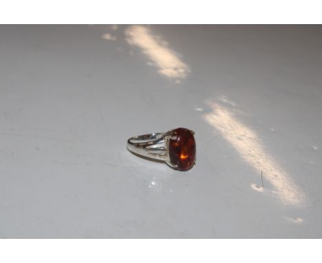 A Sterling silver and amber set ring, size L/M
