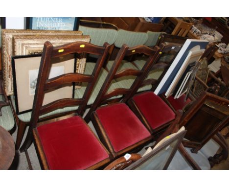 A set of four elm ladder back dining chairs with Dralon upholstered seats