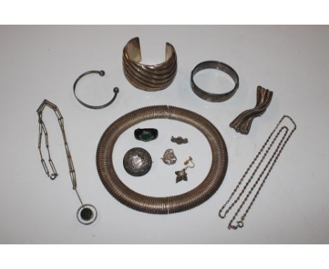 A silver snap bangle; a silver belcher chain; and a quantity of various continental silver and white metal jewellery&nbsp;