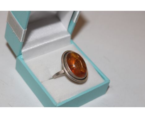 A 925 Sterling silver amber ring, size O/P