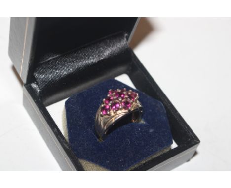 A Sterling silver and pink tourmaline set ring, size J/K