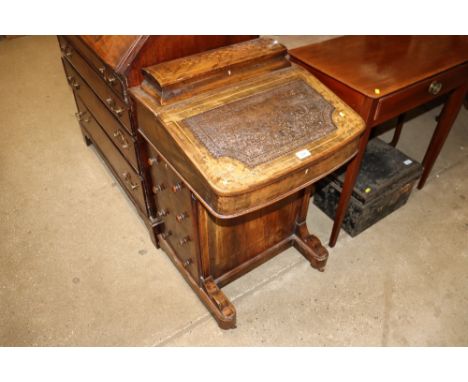 A Victorian walnut and inlaid Davenport writing desk 