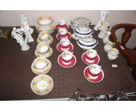 Six Chelsea bone china tea cups and saucers; a pair of sauce tureens, one with stand; a "China Rose" pattern sauce tureen and