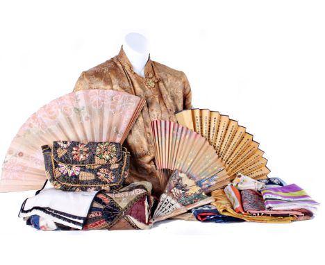 A gold coloured silk dressing gown; a crazy patchwork quilt, four paper and wood fans, a modern evening bag and a quantity of