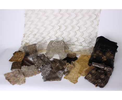 A quantity of late 19th and early 20th Century metallic lace and trimmings; to include edgings, fragments, a silver metallic 