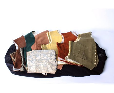A 19th Century floral silk waistcoat with a brown and blue checked lining; a Henry Poole & Co. black wool tailcoat, a mustard