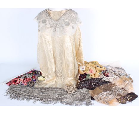 A length of early 20th Century silk ribbon; a panel of very pale pink ribbon work, a cream net and fine wool stole, lace and 