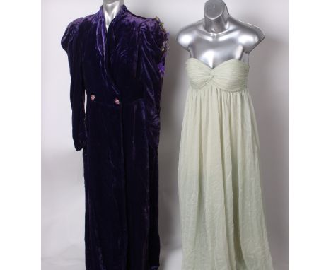 A late 1930s full length purple silk velvet evening coat; an early 20th Century black silk dress with a bead and sequin panel