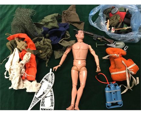A selection of 1970's Vintage Action Man clothes and a single Action Man.