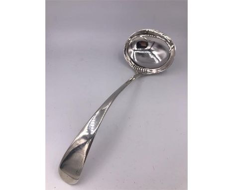 A silver ladle hallmarked Sheffield 1901 by JR