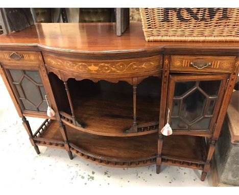 A Chiffonier with inlay, glazed doors and galleried bottom shelf.