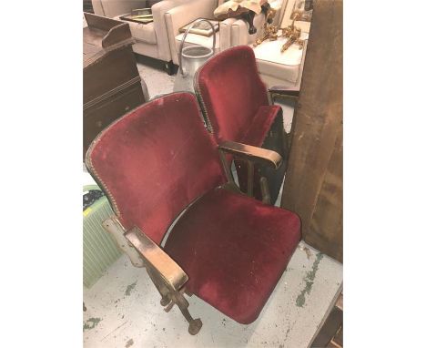 A pair of fold up Vintage Cinema seats in velvet.