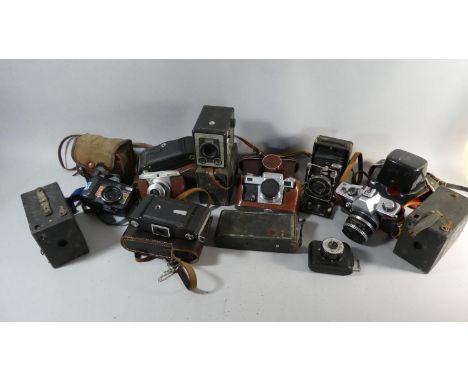 A Collection of Approximately Thirteen Vintage Cameras 