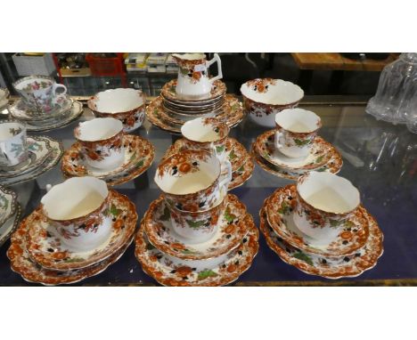 A Collection of Wellington China Teawares to Include Six Trios, Two Sugar Bowls, Various Saucers and Side Plates, Cream Jug E