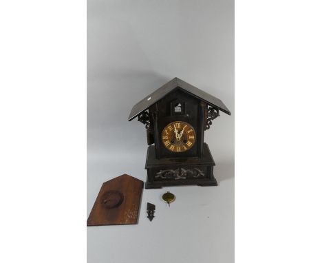 A Late 19th/Early 20th Century Black Forest Cuckoo Clock, in Need of Some Attention, 44.5cm high 