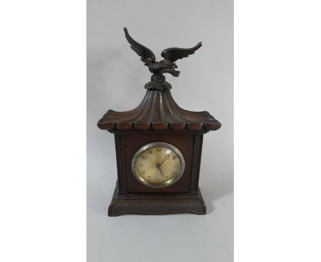 A Reproduction Mahogany Mantle Clock by Enfield with Battery Movement and Eagle Finial, 34cm High 