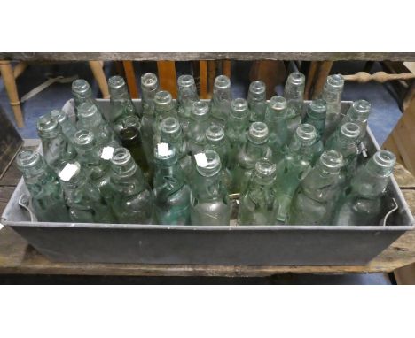 A Collection of Thirty-three Various Vintage Marble Stop and other Bottles 