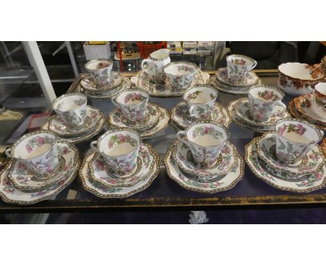A Collection of Coalport Indian Tree Teawares to Include Ten Trios, Two Bread and Butter Plates, Sugar and Cream etc 