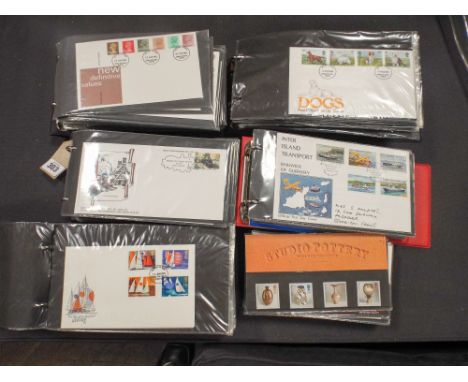 Box containing five albums of British first day covers from the 1970's through to the 1990's, together with a few Channel Isl