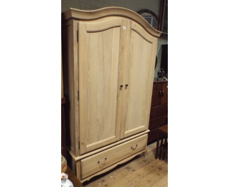 A new top quality washed oak 2 door wardrobe with drawer under about 42" wide in the French style