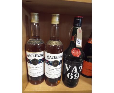 Two bottles of real Mackenzie scotch whisky and a bottle of VAT 69 whisky 