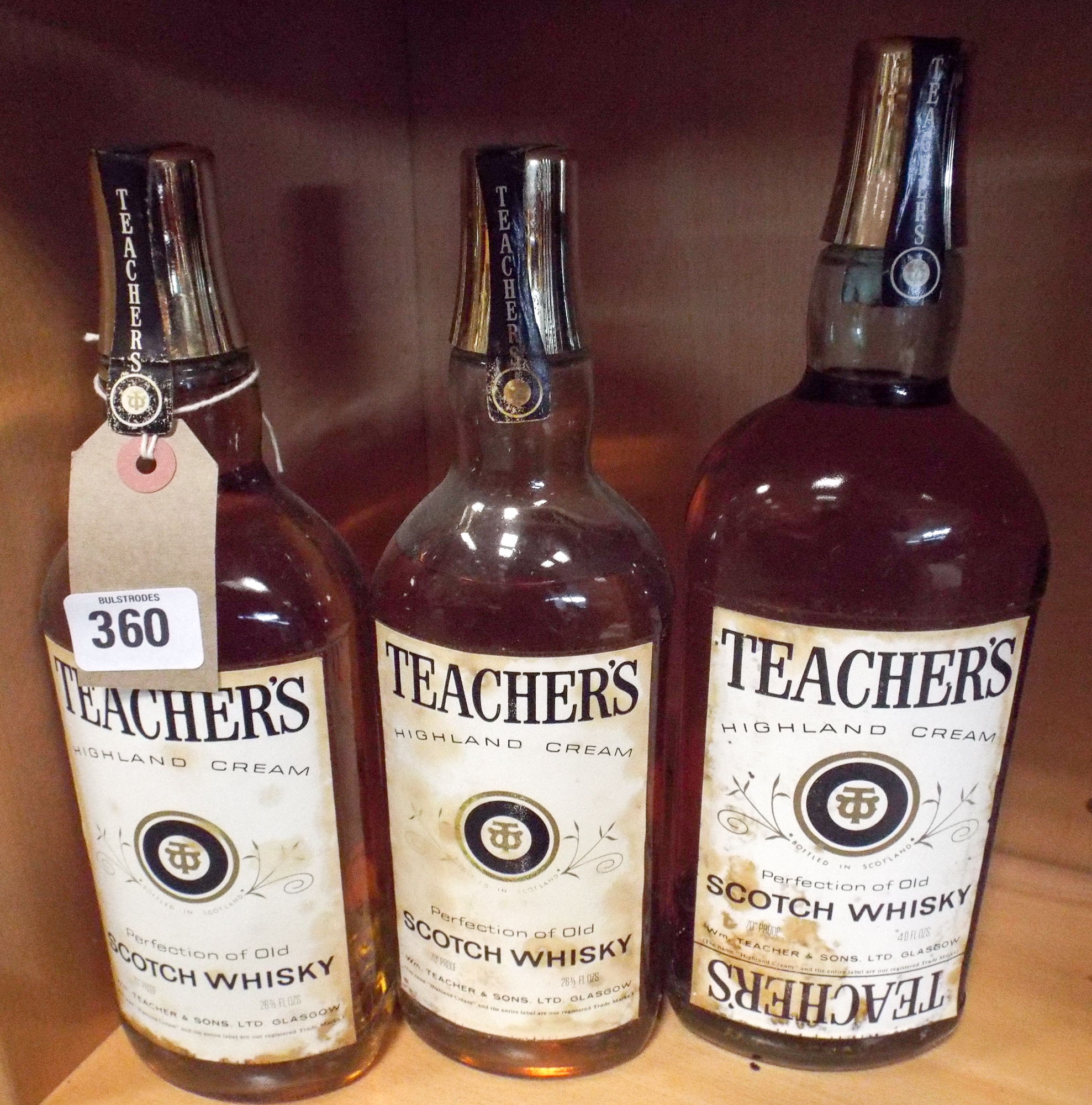 Three bottles of Teachers scotch whisky circa 1970