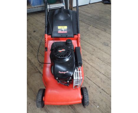 A Tecumseh petrol engine rotary mower with grass box recently serviced 