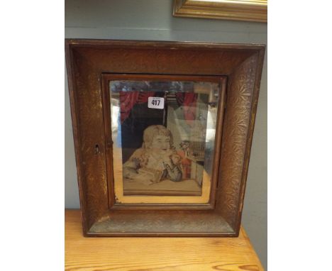 A Victorian mirrored and glazed panel key cabinet with tapestry inset panel depicting a child 