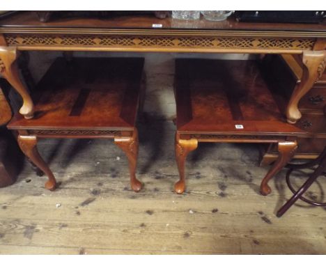 Pair of modern walnut and mahogany lamp or coffee tables standing on cabriole legs 