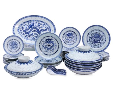A BLUE AND WHITE 'RICE GRAIN' PORCELAIN PART DINNER SET
20th Century, part painted and part transfer printed, Decorated with 
