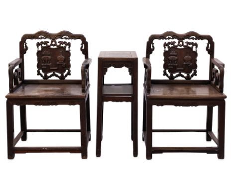 A PAIR OF HARDWOOD ARMCHAIRS WITH SIDE TABLE
Square shape, corbels to arms, carved splat of vases, censers, bats and other au