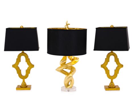 A GROUP OF GOLD FINISH TABLE LAMPS
Including a pair of keyhole geometric designed lamps in a bright gold finish with black re