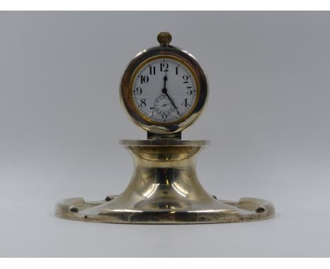 A LARGE HALLMARKED SILVER INKWELL,THE HINGED LID CONTAINING A MANUAL WOUND POCKET WATCH. 