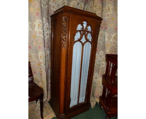 A PAIR OF CONTINENTAL ART DECO CARVED OAK INLAID PIER CABINETS WITH GLAZED DOORS AND FLORAL DECORATION.   H.166 x W.64 x D.50