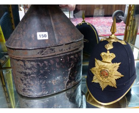 A VICTORIAN MILITARY BLUE CLOTH HELMET WITH GILT  BRASS PLATE AND SPIKE FINIAL COMPLETE WITH METAL CASE.