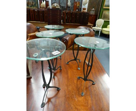 A SET OF FIVE ART NOUVEAU BRASS AND GLASS TOPPED DISPLAY STANDS.